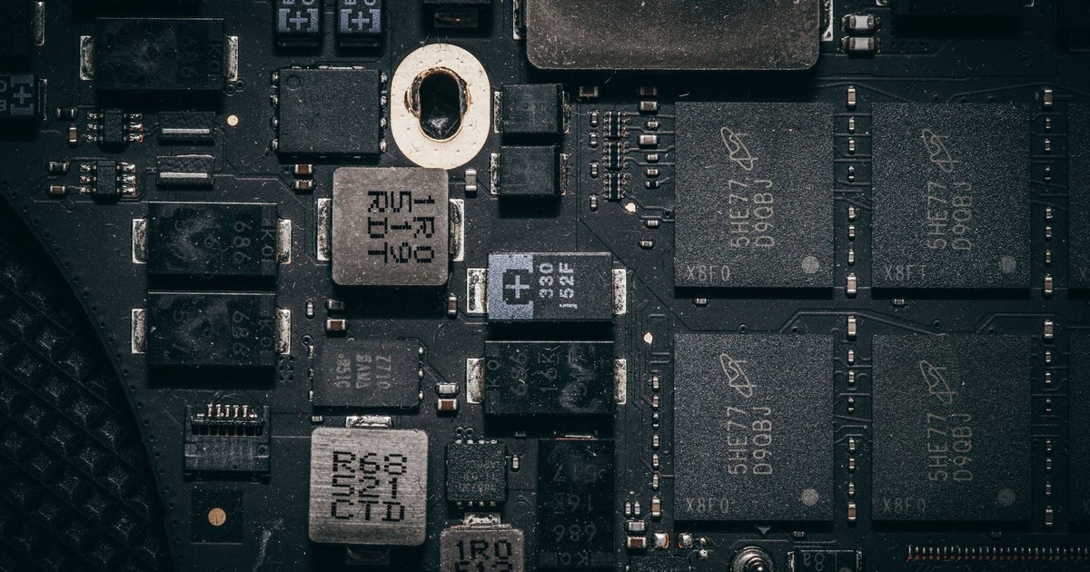 Detailed close-up of a computer circuit board highlighting electronic components and intricate design.